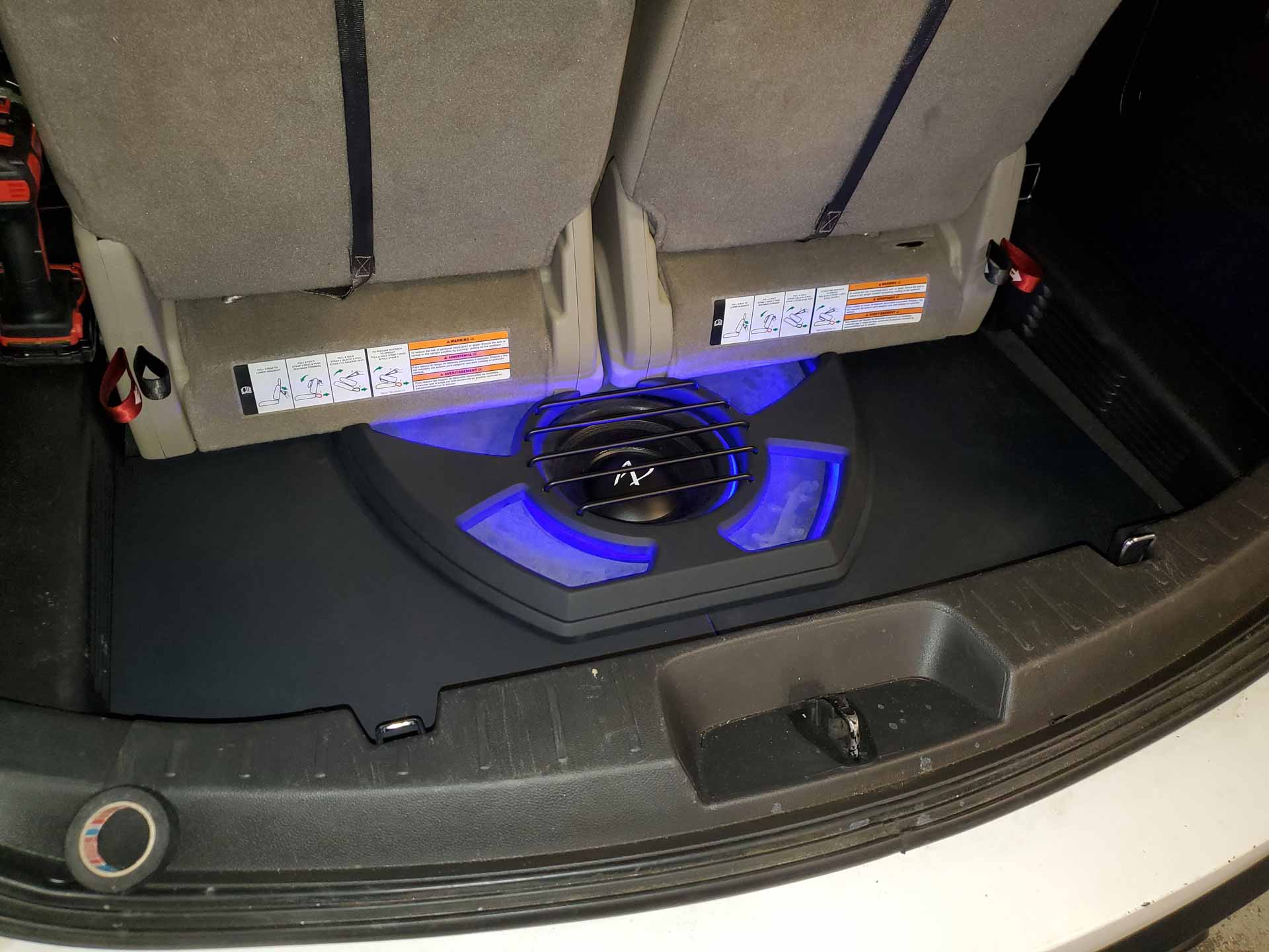 New speaker installed in trunk of car